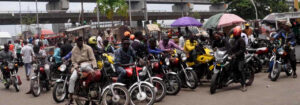 Motor Bike (aka: Okada) riders in a parking lot