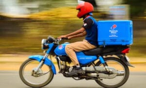 Logistic Staff on Motorbike